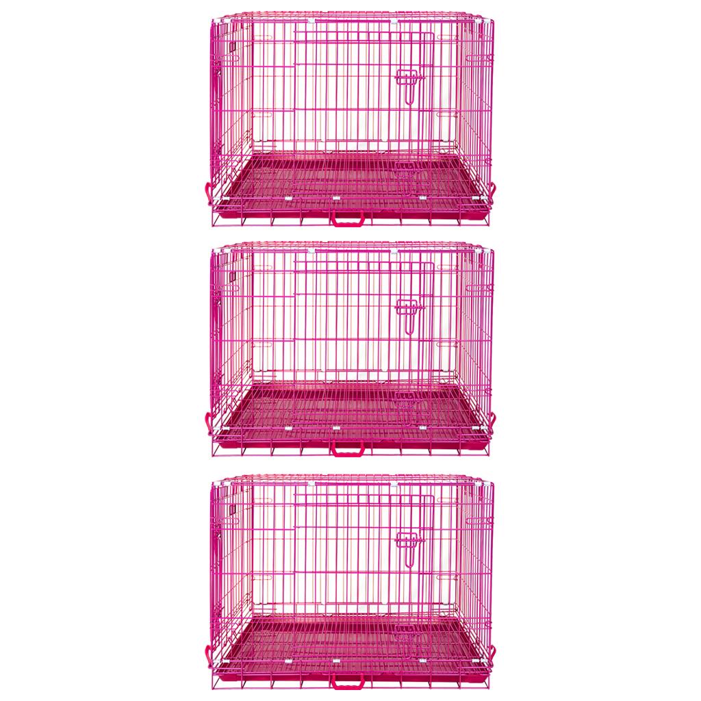 Set of three pink metal pet crates on a white background