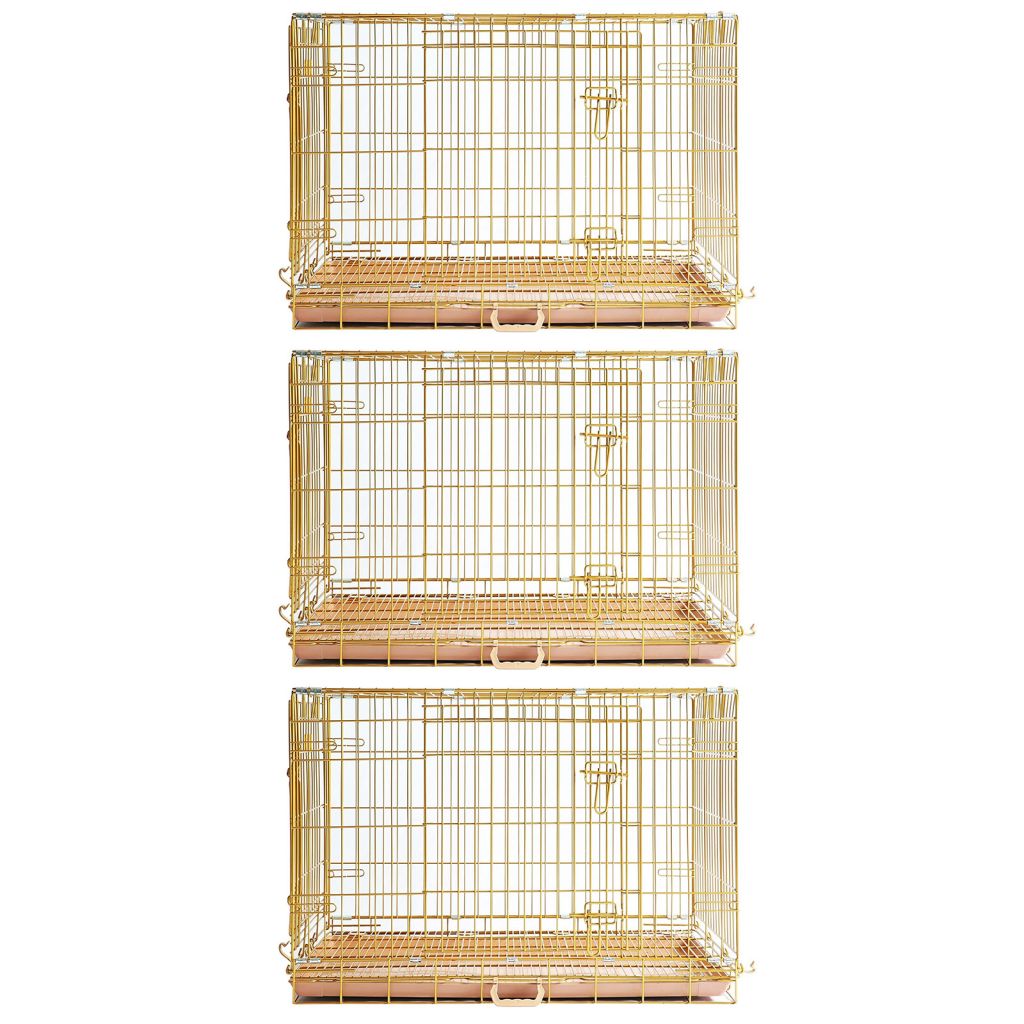 Three gold wire bird cages stacked on a white background