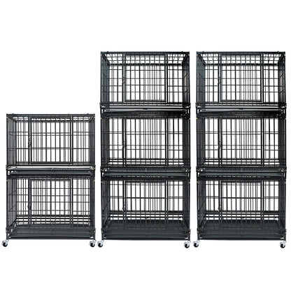 Set of black metal dog crates of different sizes on a white background