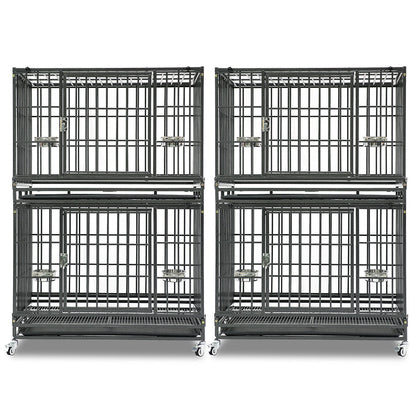 Four black metal dog cages stacked on a white background
