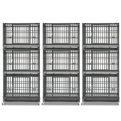 Set of six black metal dog crates stacked on a white background
