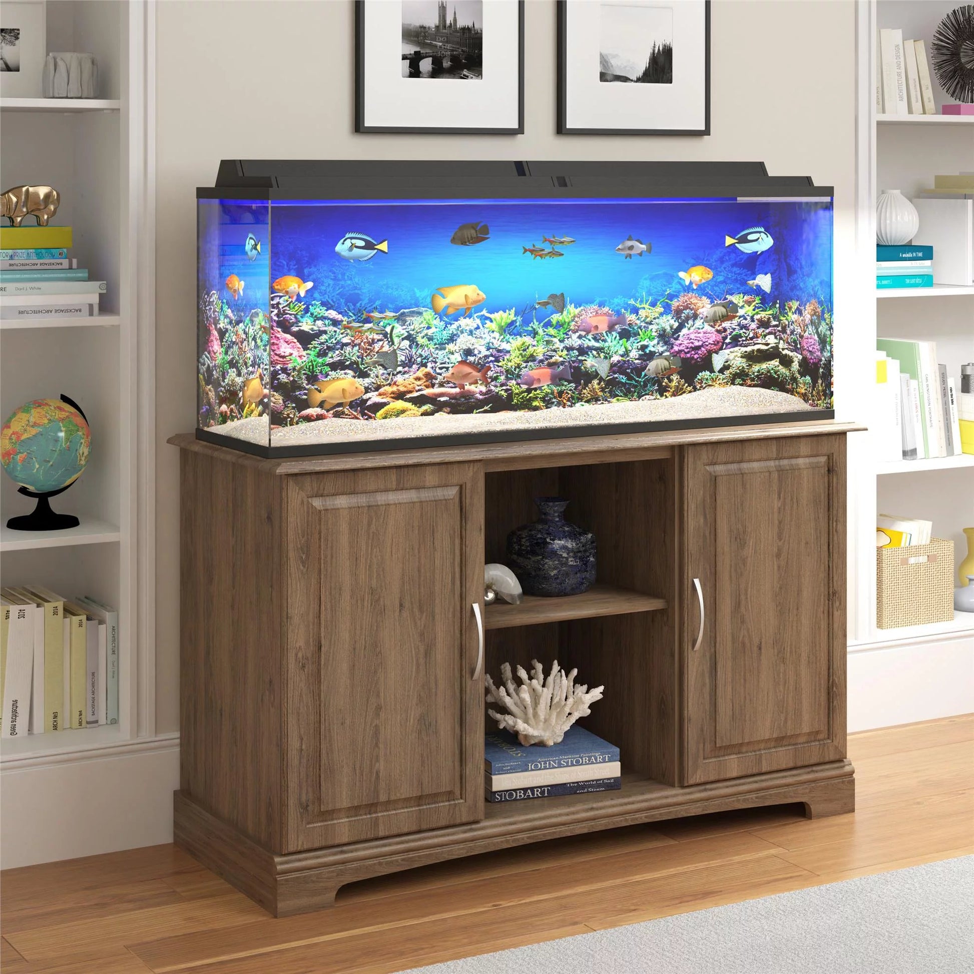 Large aquarium inside a wooden cabinet with books and decor around