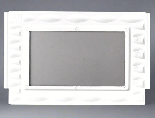 White decorative frame with a textured surface on a gray background