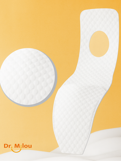 White silicone bib with a circular pad on an orange background, featuring the Dr. Mjou brand.
