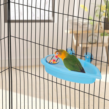 Bird perched on a blue perch inside a birdcage with a blurred indoor background