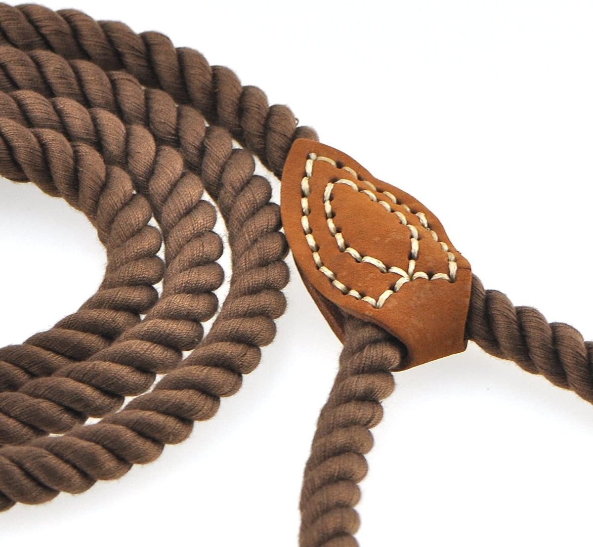 Brown rope with a leather heart-shaped buckle on a white background