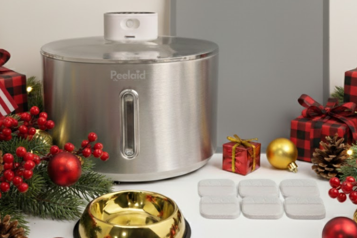 Peelaid Water Dispenser with holiday decorations and sale information on a white background