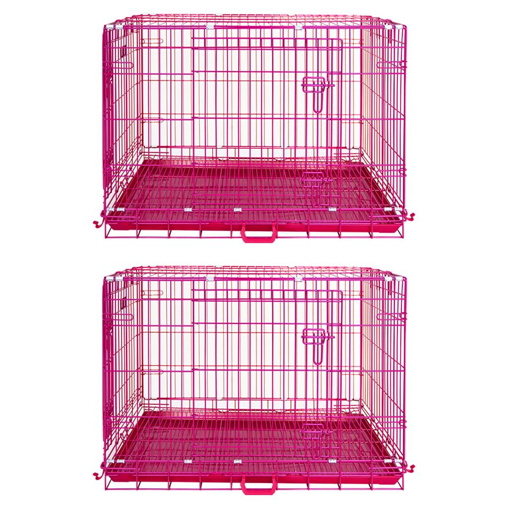 Two pink metal dog crates on a white background