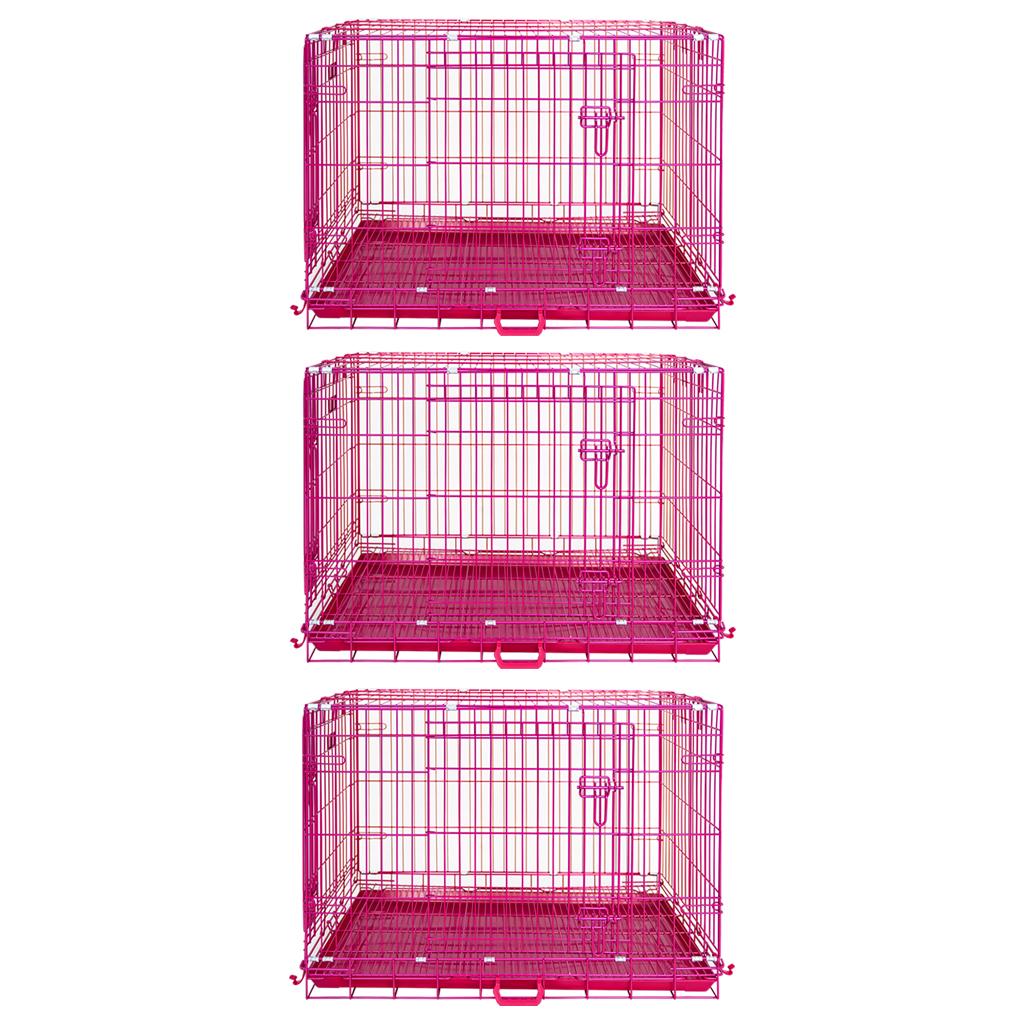 Set of three pink metal pet crates on a white background