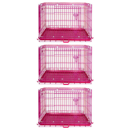 Set of three pink metal pet crates on a white background