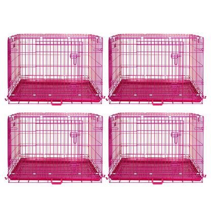 Four pink metal dog crates on a white background