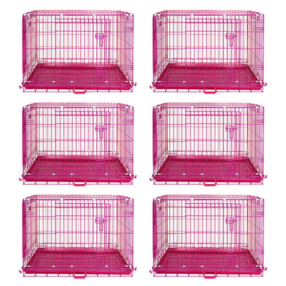 Six pink metal dog crates on a white background