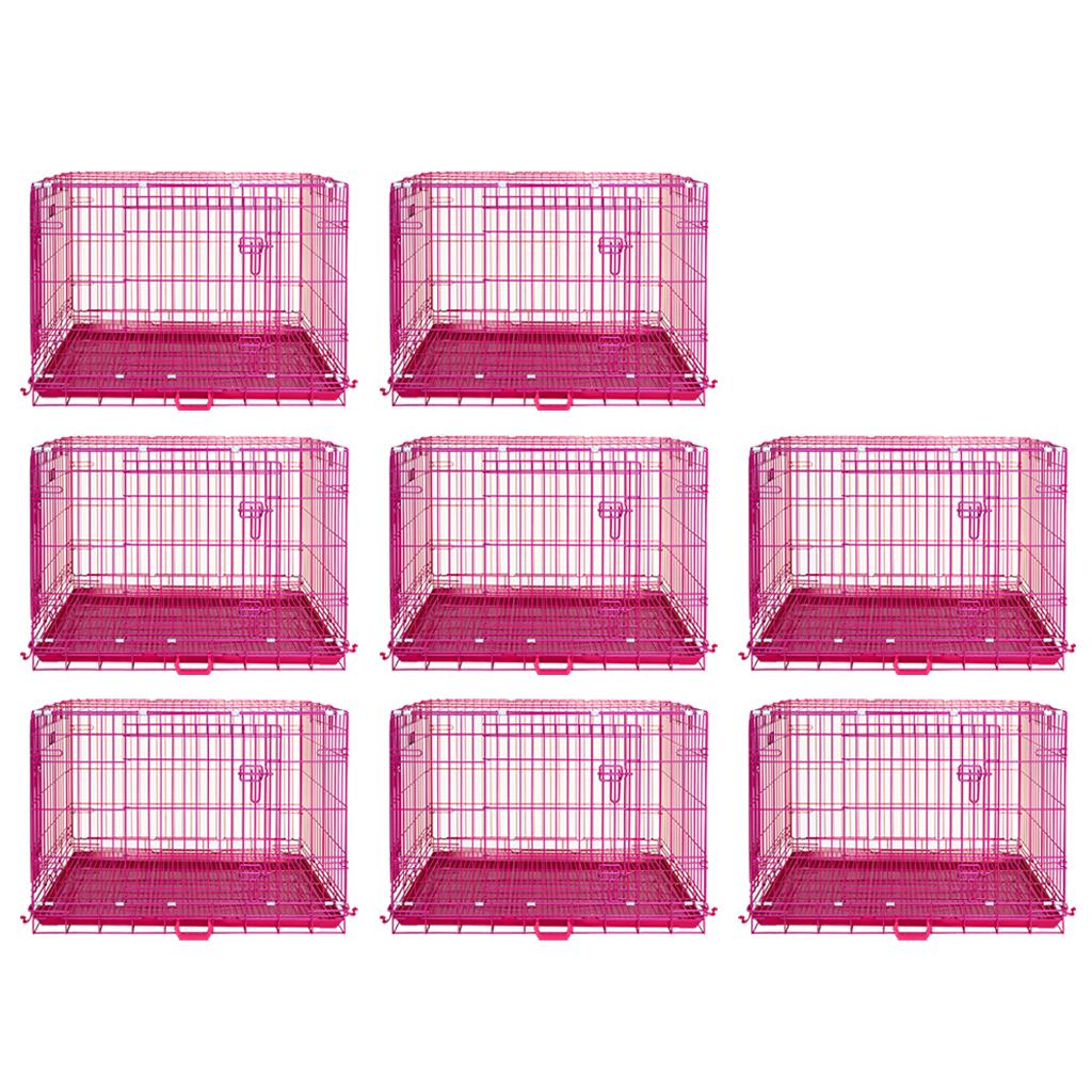 Nine pink metal dog crates on a white background
