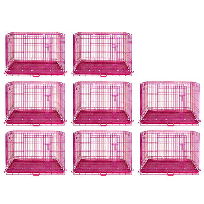 Nine pink metal dog crates on a white background
