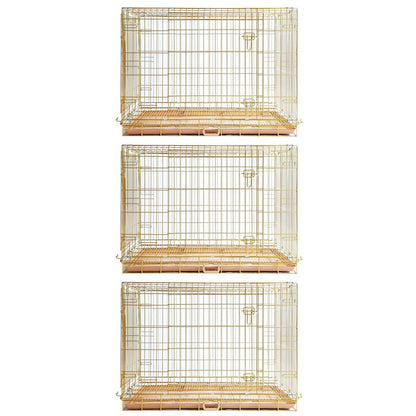 Set of three gold wire bird cages on a white background