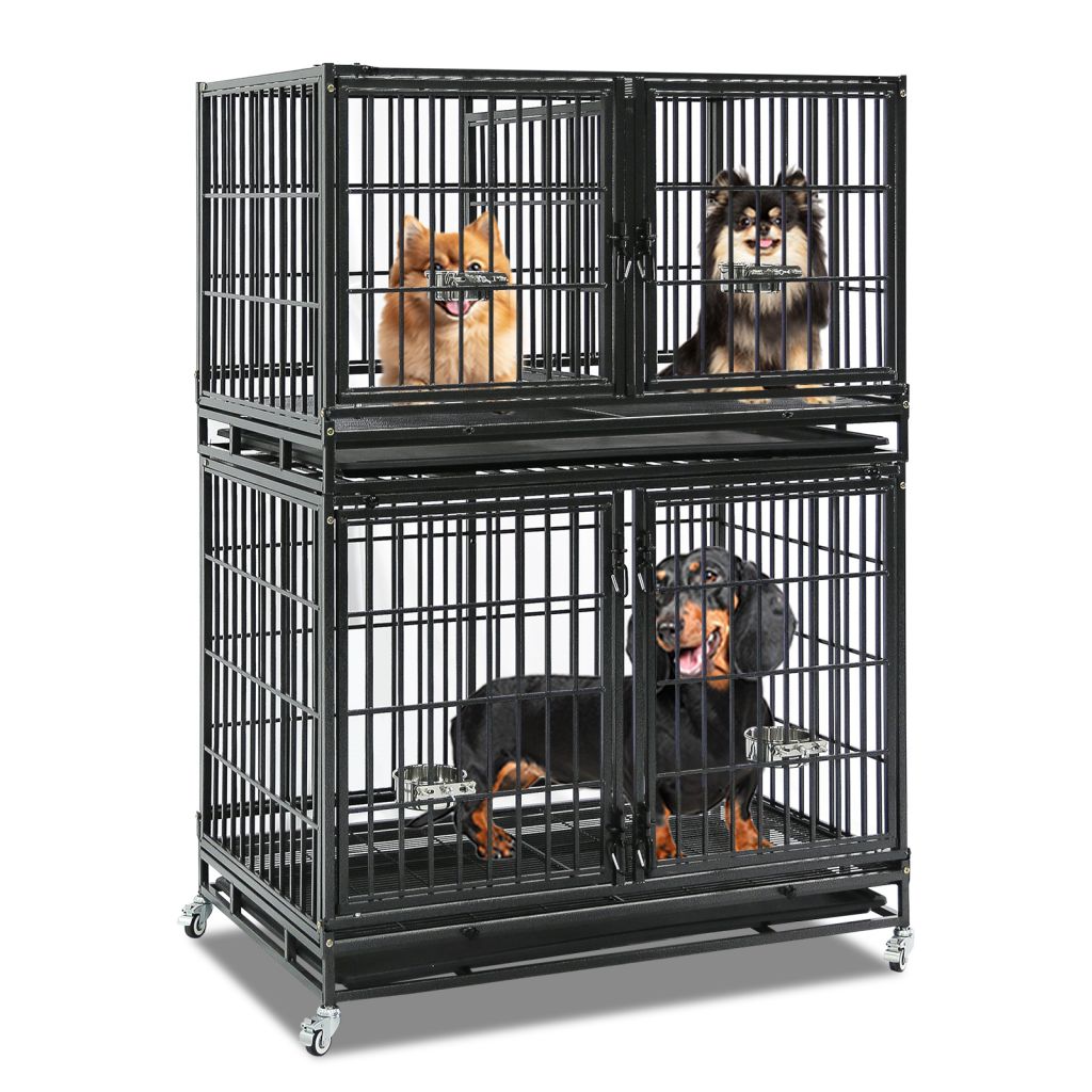 Stack of black metal dog crates with dogs inside on a white background