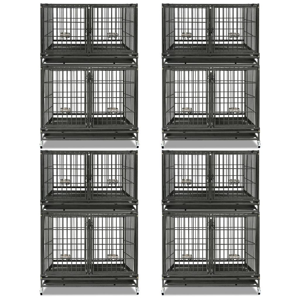 Stack of black metal dog crates on a white background
