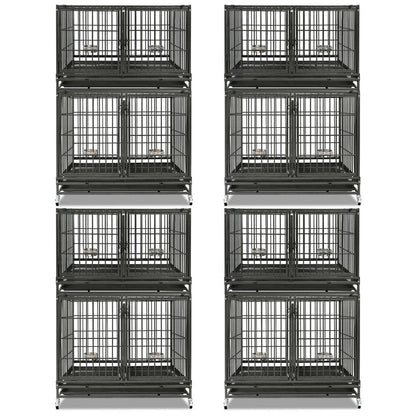 Stack of black metal dog crates on a white background