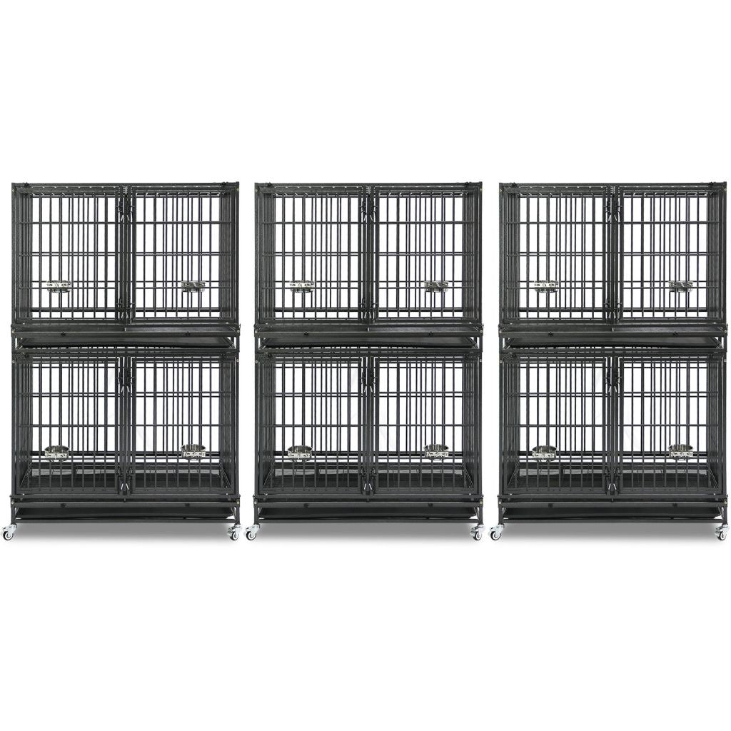 Set of four black metal dog crates on a white background