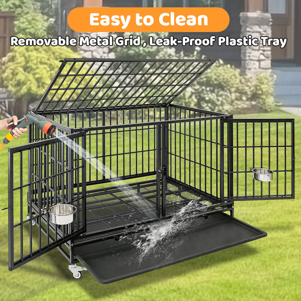 Pet cage with removable metal grid and leak-proof plastic tray being cleaned with a hose.