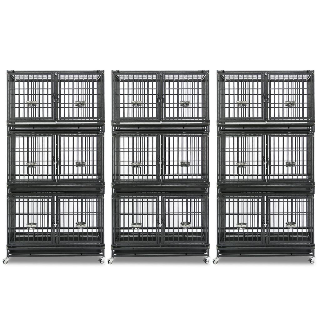 Set of black metal dog crates stacked on a white background