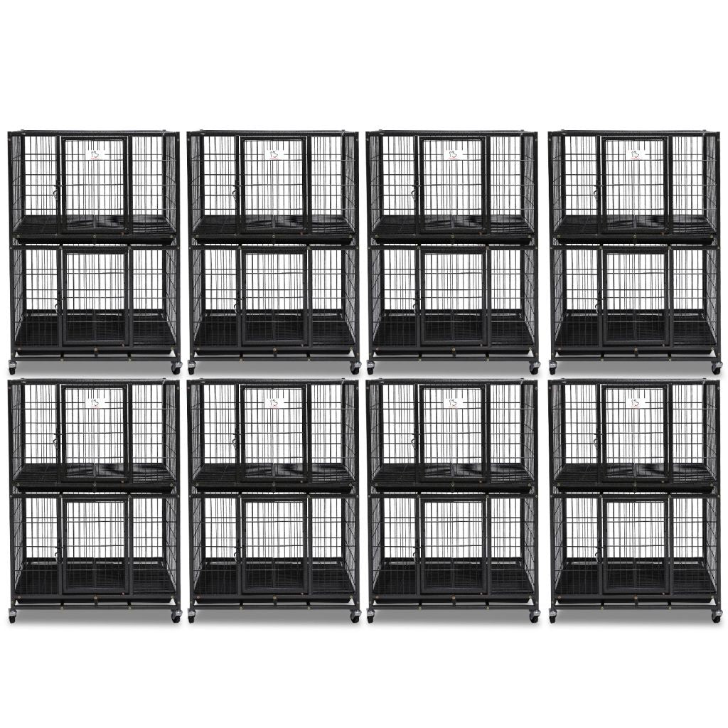 Multiple black pet crates stacked on a white background