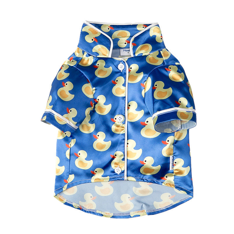 Children's swim shirt with rubber duck pattern on a blue background