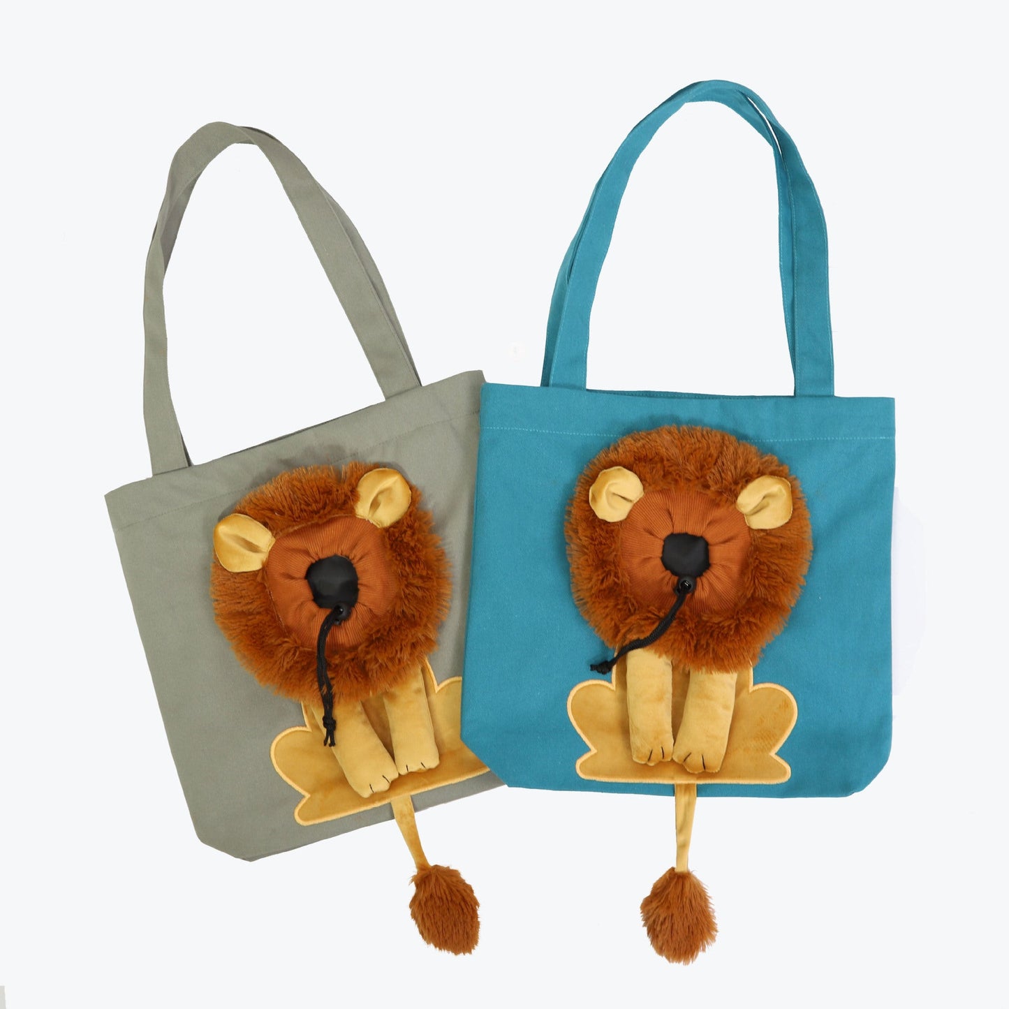 Two tote bags with lion face designs on a white background