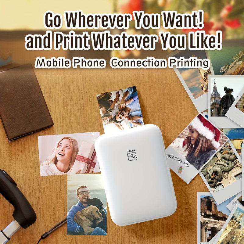 Portable photo printer on a wooden table with printed photos and text 'Go Wherever You Want! and Print Whatever You Like!'