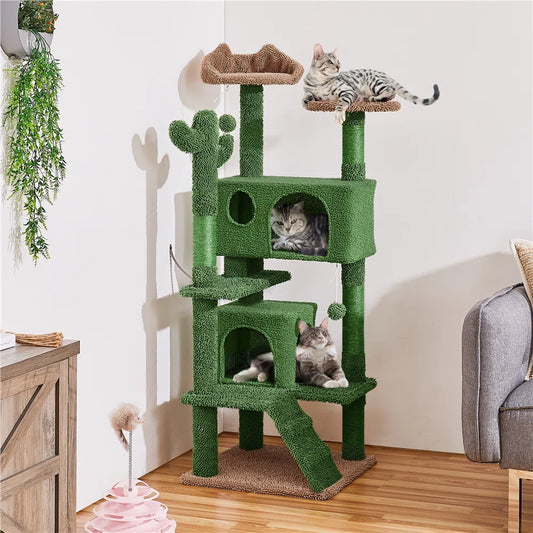 Green cat tree with multiple levels and a cat resting on top in a room setting on a white background.