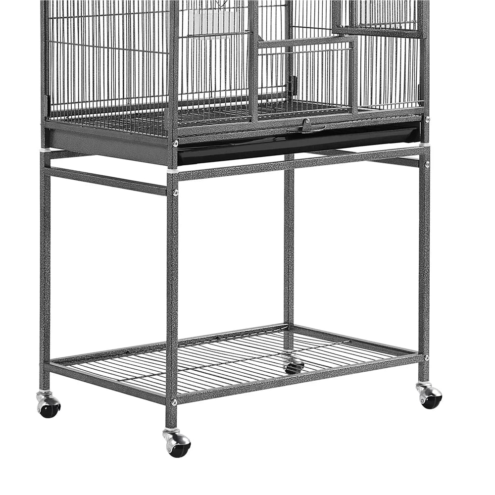 Metal bird cage with wheels on a white background