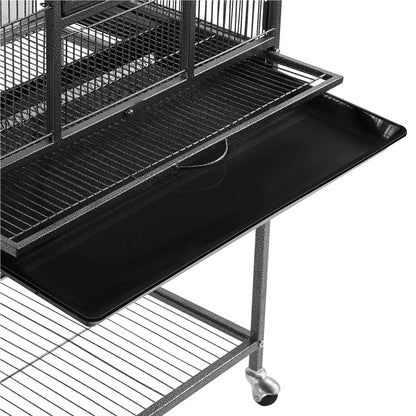 Black bird cage with a flat tray on a white background