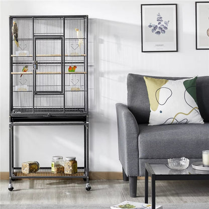 Birdcage next to a gray sofa in a living room setting