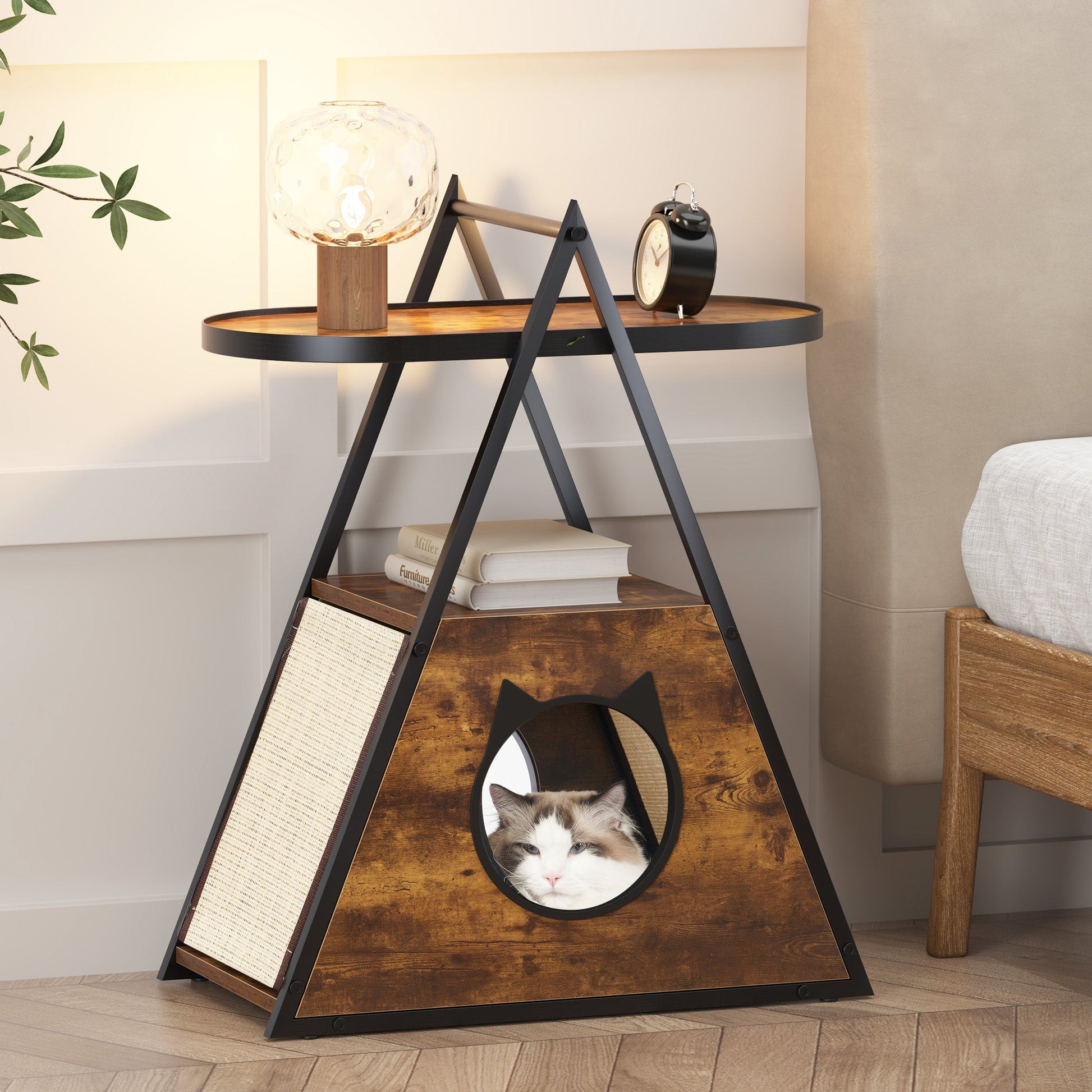 Wooden pet teepee with a cat peeking out, placed on a wooden floor in a room.