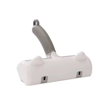 White and gray pet grooming tool on a white background