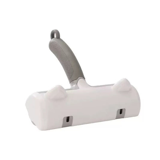 White and gray pet grooming tool on a white background