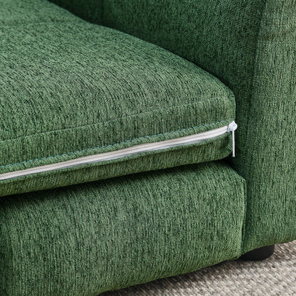 Close-up of a green upholstered chair with a zipper detail.