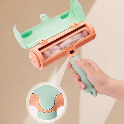 Hand holding a green and pink pet hair removal roller with a close-up inset on a beige background.