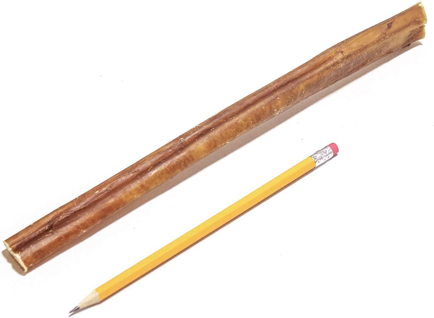 Long wooden stick next to a yellow pencil on a white background