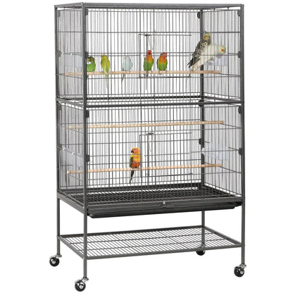 Large bird cage with multiple birds on a white background