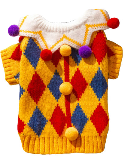 Colorful argyle patterned sweater with pom-pom details on a white background