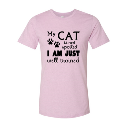 Pink t-shirt with black text and paw prints on a white background