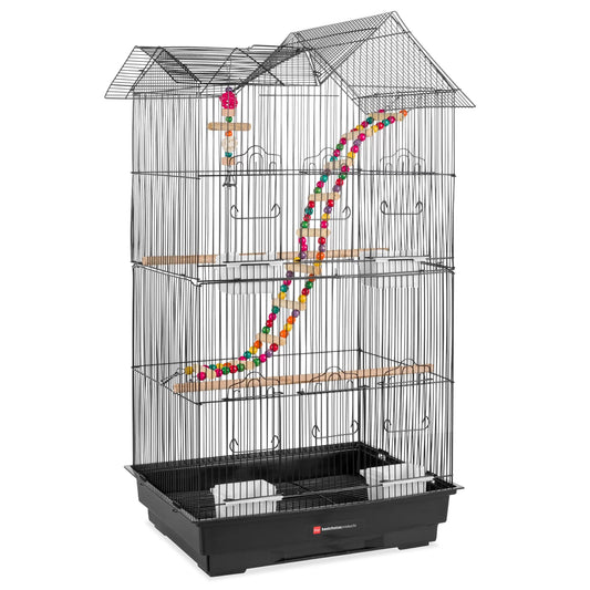 Bird cage with perches and colorful beads on a white background