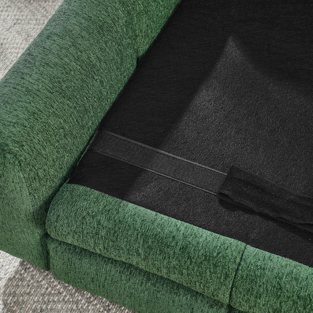 Close-up of a green fabric surface with a black strip