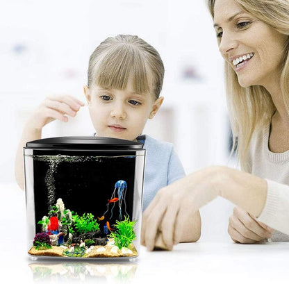 Woman and child looking at a small aquarium together