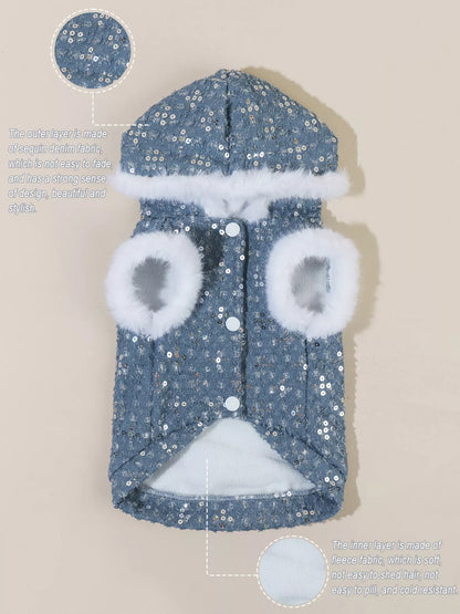 Blue sequin dog coat with white fur trim on a beige background