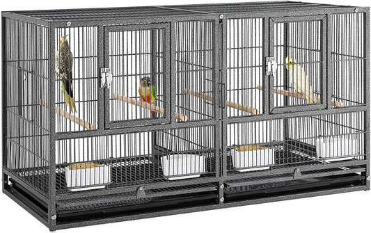 Large bird cage with multiple compartments and birds inside