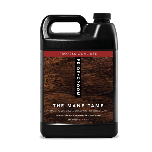 Black bottle of 'The Mane Tame' shampoo for pets with a brown label on a white background