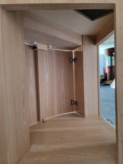 Wooden shower enclosure with glass door
