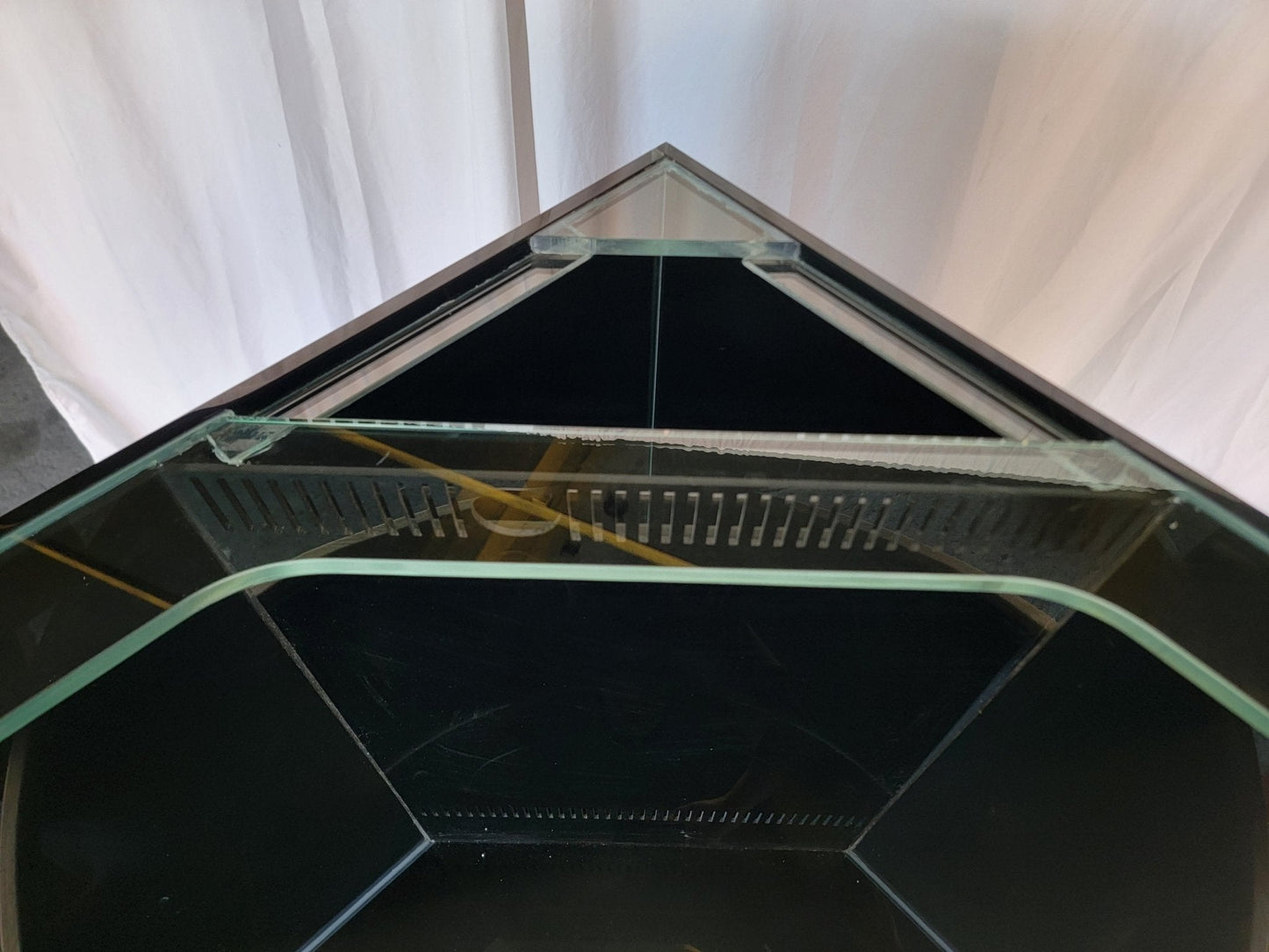 Glass panel with a metal frame on a white background